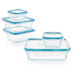 Set of clear food storage containers with blue lids on a white background