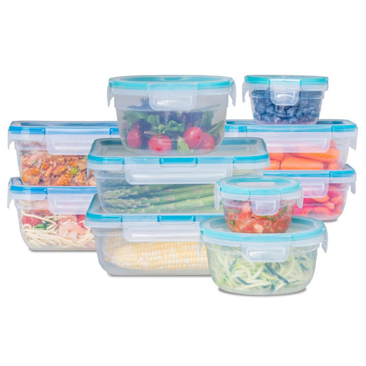 Set of clear food storage containers with blue lids, filled with various foods on a white background.