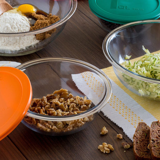 Glass bowls with ingredients on a wooden table